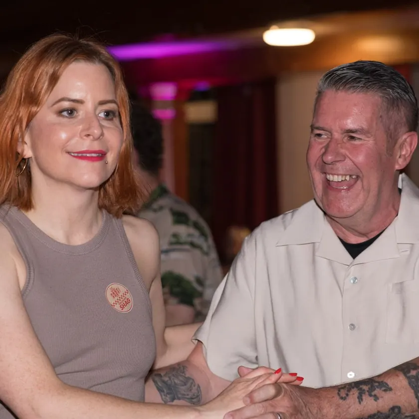 Two dancers laughing together at Fast Feet Fest